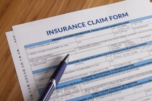 A snapshot of an insurance claim form symbolizing various insurance policies and claims